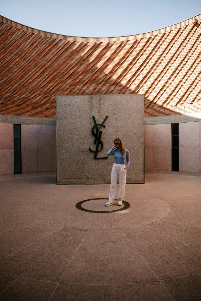 Woman at the Yves Saint Laurent memorial in Marrakech